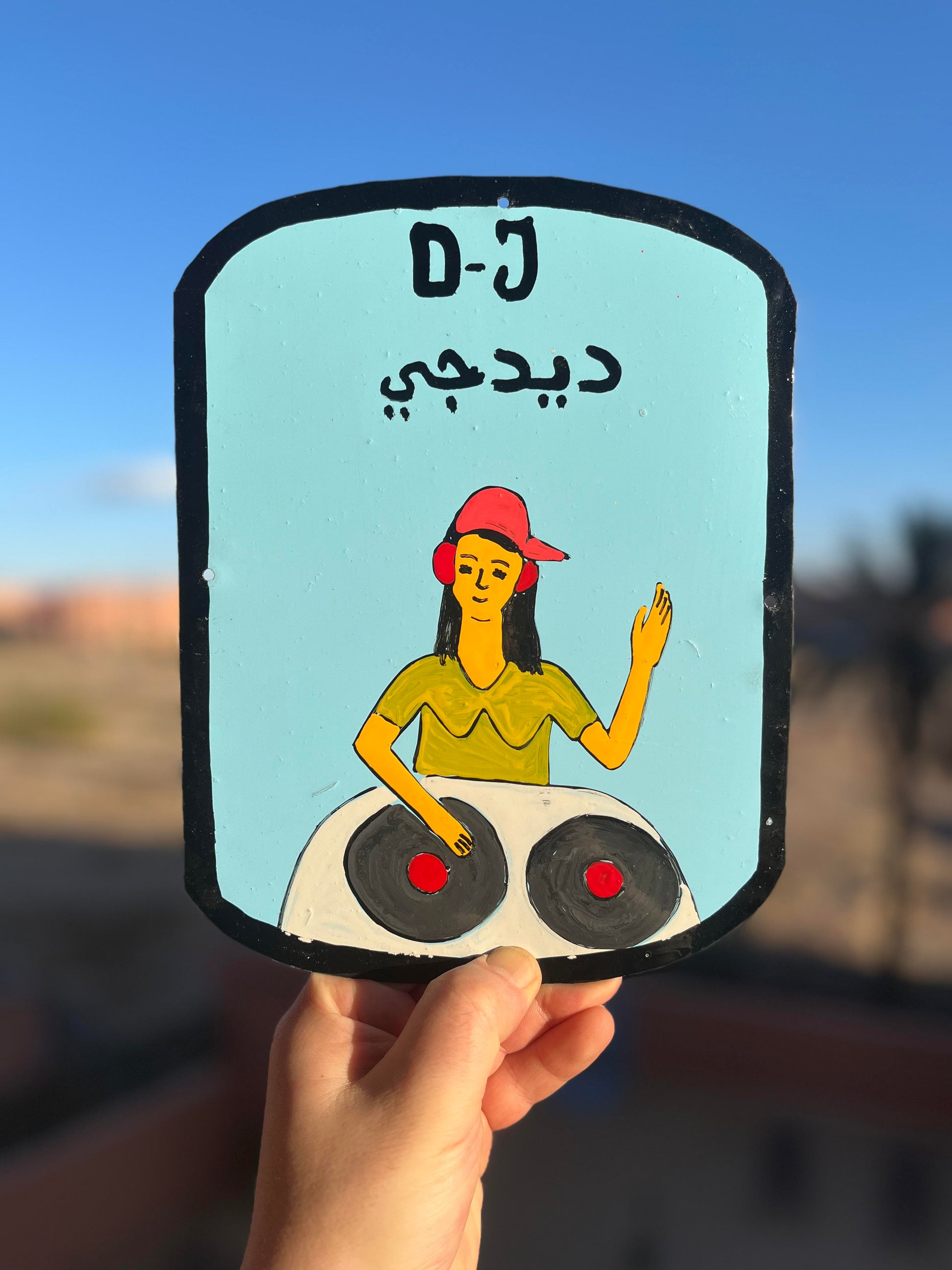 DJ woman (green top) - Moroccan tin sign-1