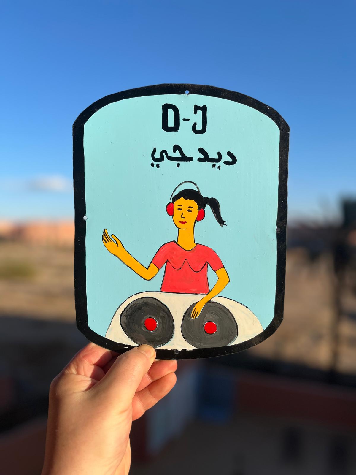 DJ woman (red top) - Moroccan tin sign